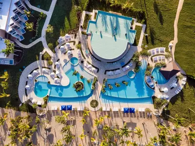 an overhead view of a swimming pool at a resort at Viva Miches by Wyndham, a Trademark All Inclusive Resort in Miches