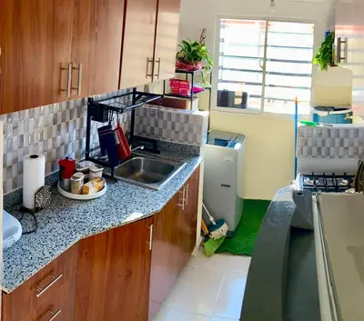 a kitchen with a sink and a counter top at Acogedor apartamento amueblado in Los Paredones