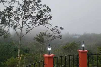 two lights on top of a black fence at Villa Tortuga Constanza in Constanza