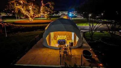 a tent sitting on top of a wooden deck at Bubble Glamping Sosua! in Sosúa
