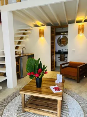 a living room with a coffee table and a couch at Leeloo Boutique Hotel in Las Terrenas
