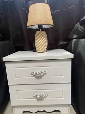 a white dresser with a lamp on top of it at Luxury Penthouse Santo Domingo W in Santo Domingo