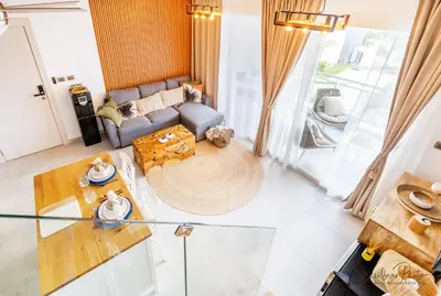 an overhead view of a living room with a couch at Syrma 302 Estrella Dominicus Apartment in La Laguna