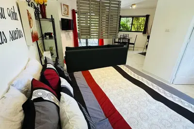 a bedroom with a bed in a room at Residencial Tropimar Sosua in Sosúa