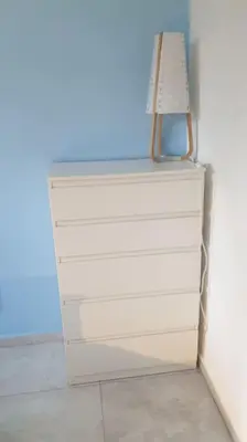 a white dresser with a lamp on top of it at CasaMia RD B&B in Río San Juan