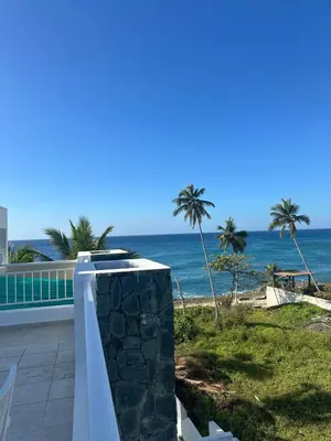 a view of the ocean from the balcony of a house at Paradise1 in Juan Dolio
