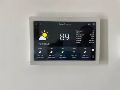 an ipod with the sun on the screen on a wall at RoyalSuite 1BDR-Poll-Gym-Saune-g17 in Santo Domingo