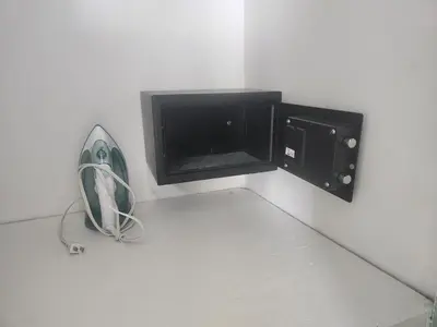 a white room with a fan and a microwave at Penthouse Apartment with Bay and Mountain Views, Rooftop BBQ, AC, Fast WiFi, Near Saladilla Beach, Barahona in Santa Cruz de Barahona