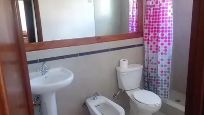 a bathroom with a sink and a toilet and a shower at Tropical Caribe in Bayahibe
