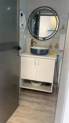 a bathroom with a sink and a mirror at Mar & Relax in Santo Domingo