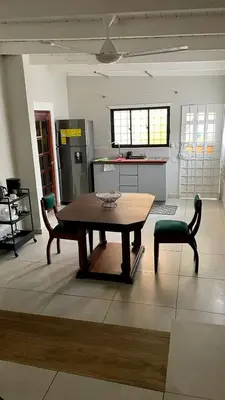 a living room with a table and two chairs at Apartamento Estudio Puerto Plata in San Felipe de Puerto Plata