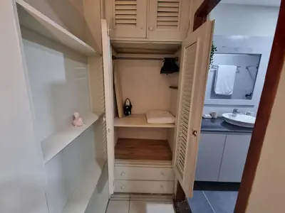 a walk in pantry with a cupboard and a sink at Apartamento Estudio Puerto Plata in San Felipe de Puerto Plata