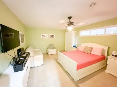a bedroom with a bed and a desk in it at Marbella, Juan Dolio, Republica Dominicana in Juan Pedro