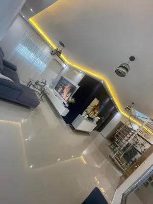 an overhead view of a living room with a couch at Apartamento completo con jacuzzi y gazebo in Santo Domingo