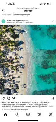 an aerial view of a beach and the ocean at Beach Front Apartments by Playa Palmera in Punta Cana