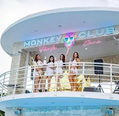 a group of girls standing on a cruise ship at Beach Front Apartments by Playa Palmera in Punta Cana