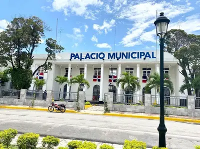 a street light in front of a malaga municipal building at Beautiful and peaceful 2-bedroom family condo in Juan Dolio