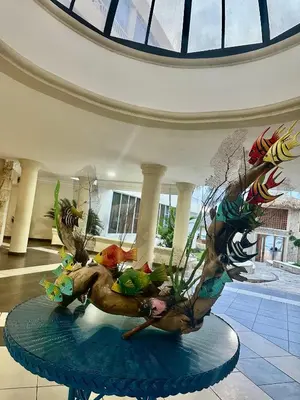 a sculpture of a deer on a table in a building at Apartamento ll Vista al Mar Albatros BY JU Juan Dolio in Juan Dolio