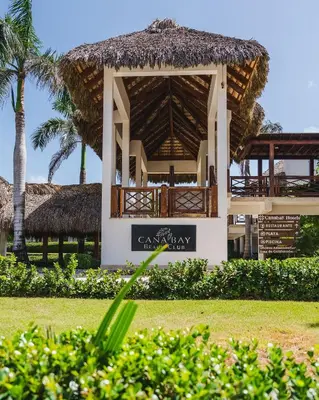 a pavilion with a sign in front of a resort at 1BDR Rockstar's Paradise in front of Hard Rock H. in Punta Cana