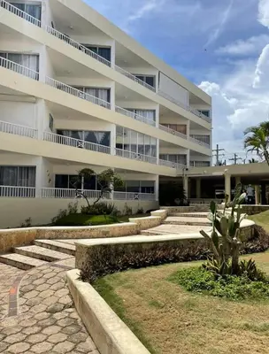 a large white building with steps in front of it at Estancia Nana Tu Refugio con Vista al Mar, Piscina, wifi, lavadora secadora Reserva Ahora in Juan Dolio