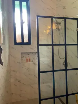 a shower with a glass door in a bathroom at Casa Monte Verde in Las Galeras