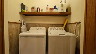 a small bathroom with two washers at Hispaniola Beach Retreat in Sosúa