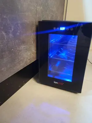 a small black box with blue lights in it at Luxury Apartment Downtown in Santiago de los Caballeros