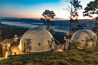 two domes on top of a hill with a view at The Domes Jarabacoa in Jarabacoa