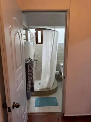 a bathroom with a shower and a toilet at DiNancyCasolare - La Colonia, SC in Cambita Garabitos