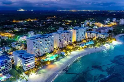 an aerial view of a beach at night at SuiteDelux Oceanview Marbella 3BDR in Juan Pedro