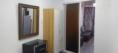 a room with a mirror and a dresser and a hallway at Apartamento en la Zona Colonial in Santo Domingo