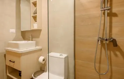 a bathroom with a shower and a toilet and a sink at New pool views Sausalito Residencial close to Playa Bavaro in Punta Cana