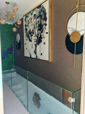 a bathroom with a picture of a tree on the wall at Luxury penthouse con jacuzzi privado, Gym, pool in Santo Domingo