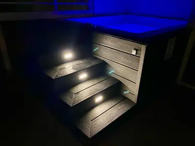 a wooden cabinet with lights in a dark room at Estrella del caribe in La Laguna