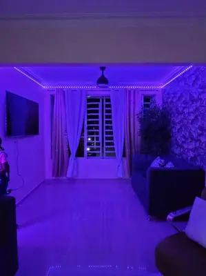 a living room with purple lights in a room at comodidad y tranquilidad in Mendoza