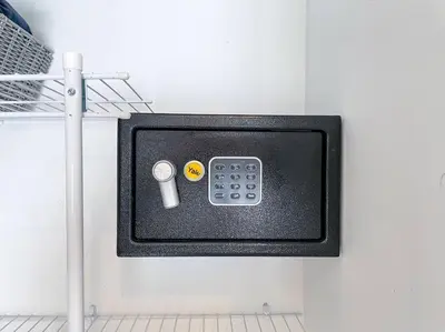 a tv on a wall with a remote control at Modern City Condo El Millon in El Jobo de Mendoza