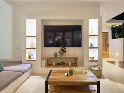 a living room with a couch and a coffee table at Villa Vista in Las Terrenas