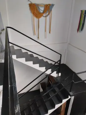 a glass stair case in a room with a stair case at Casa Santa la laguna in La Aguada