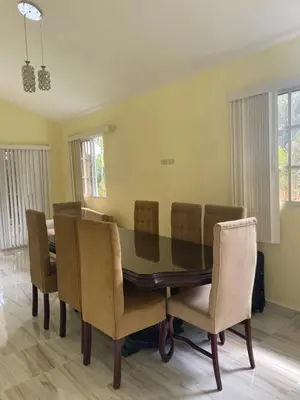 a dining room with a table and chairs at Ático riomar segundo piso in Santa Bárbara de Samaná