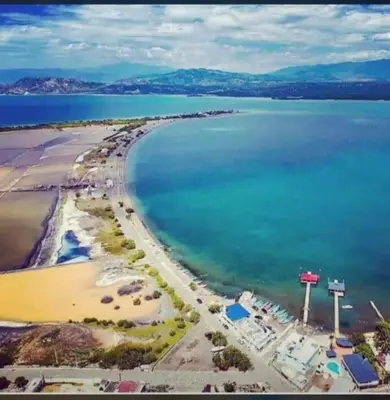 an aerial view of a beach and the ocean at La casa de Marcel et Nathalie in Baní