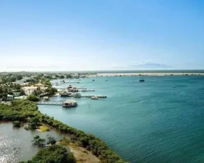 an aerial view of a harbor with boats in the water at La casa de Marcel et Nathalie in Baní