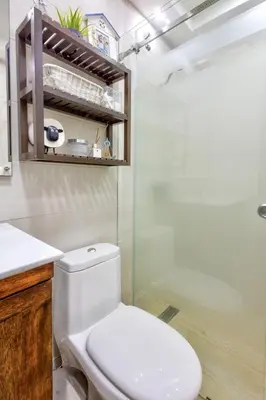 a bathroom with a toilet and a shower at Las Olas, Juan Dolio 2bed2bath Condo in Guayacanes