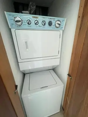 a white washer and dryer in a room at Las Olas, Juan Dolio 2bed2bath Condo in Guayacanes