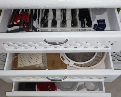 a white drawer filled with lots of utensils at Caribe Home Dominicus Oleandra 3 in La Laguna