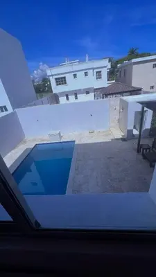 a view of a building from a window at Crown ll-3 Bedrooms-Pool-Close to everything! in San Felipe de Puerto Plata