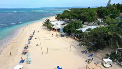 an aerial view of a beach with a volley ball court at Crown ll-3 Bedrooms-Pool-Close to everything! in San Felipe de Puerto Plata