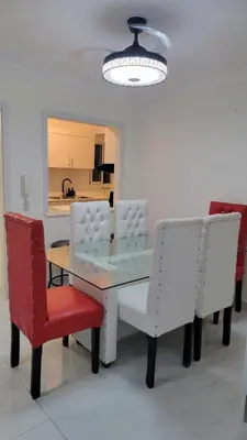 a dining room with a table and two chairs at Klinda Luxury Home Apartament Mi Casa es tu Casa in Mendoza