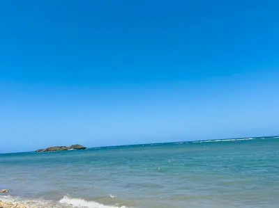 a view of the ocean from the beach at Divine Stay 3 Bedroom One minute from the beach on the malecon in San Felipe de Puerto Plata