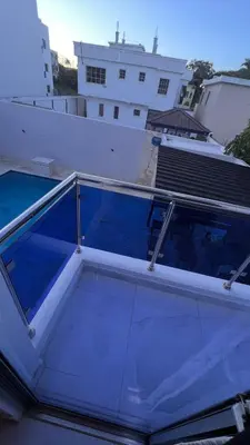 a balcony on the top of a building at Crown lll with Pool -3 Bedrooms close to Everything in Puerto Plata