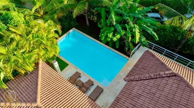 an overhead view of a swimming pool on top of a house at Casa feliz in Sosúa